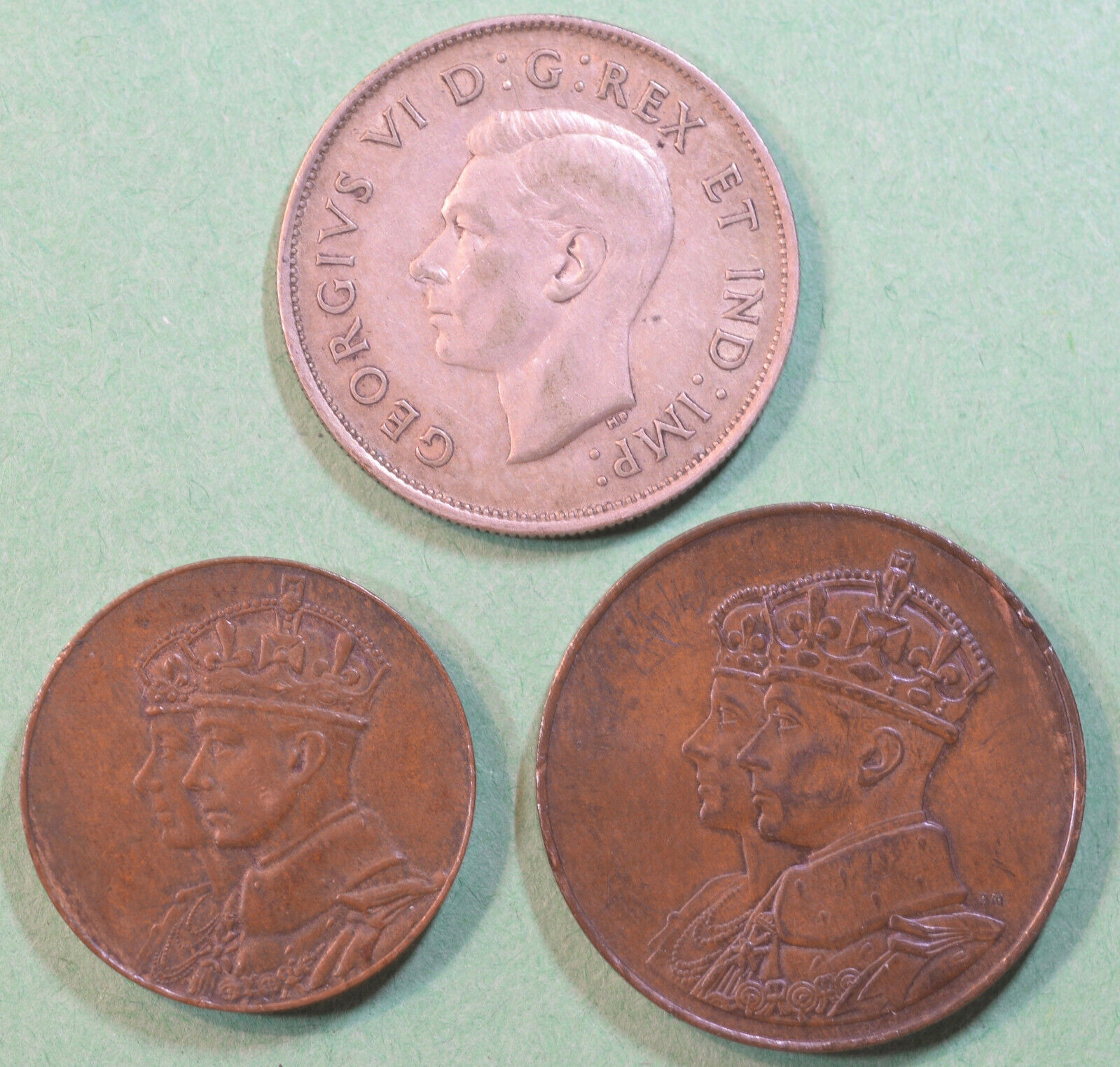 1940 Canada Half Dollar And Two 1939 Canadiain Tokens